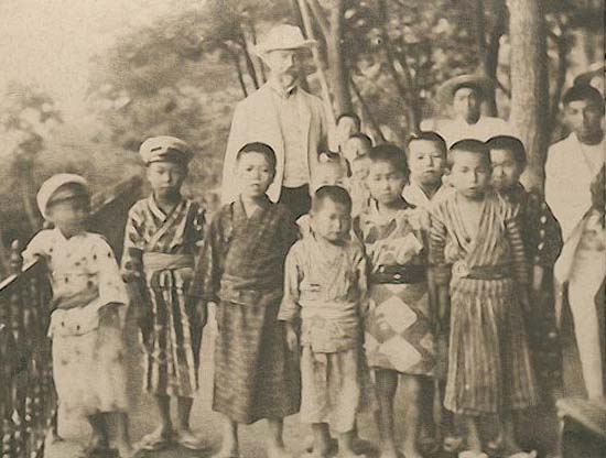 Edward Whitney with Asian Children Photo