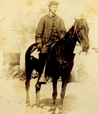 Edward Whitney on horseback Photo